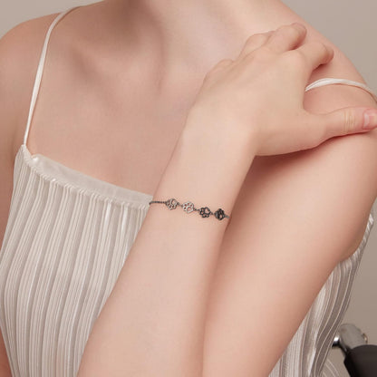 Sterling Silver Paw Print Bracelet – Adjustable Fit